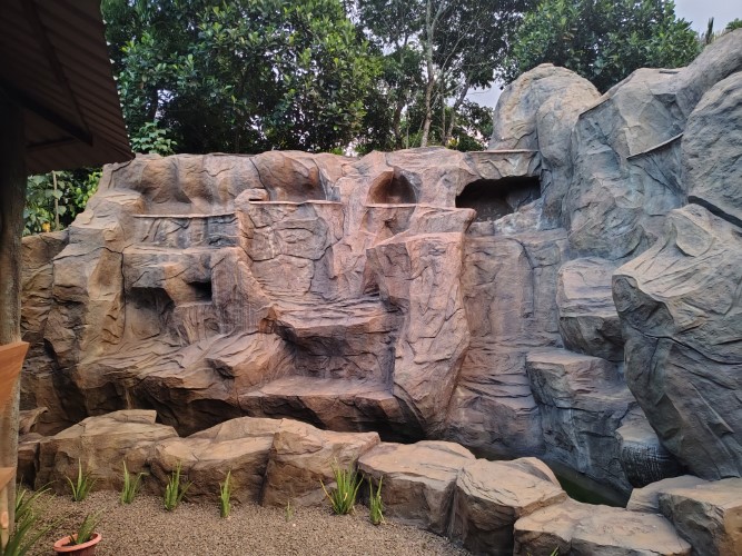 Waterfall cave feature